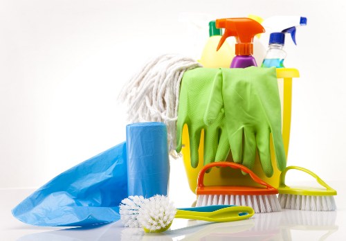 Professional Welling carpet cleaners treating a stained carpet