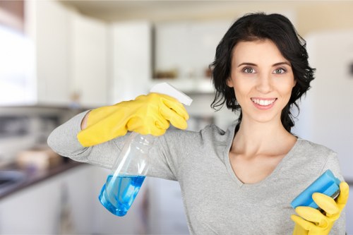 Professional cleaner applying careful carpet cleaning methods